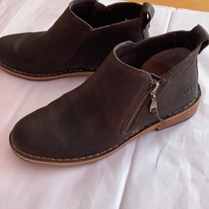 Ladies size 6 1/2 Ugg Shearling soles booties.Rubber soles.